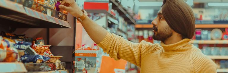 Man shopping in supermarket